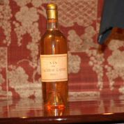 Lafite Blanc bottle with wine